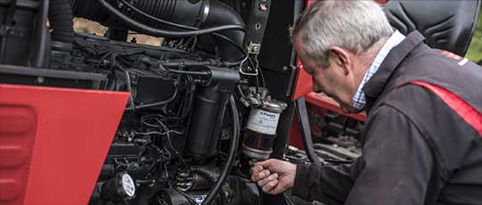 Pathfinder Power employee servicing Perkins filter